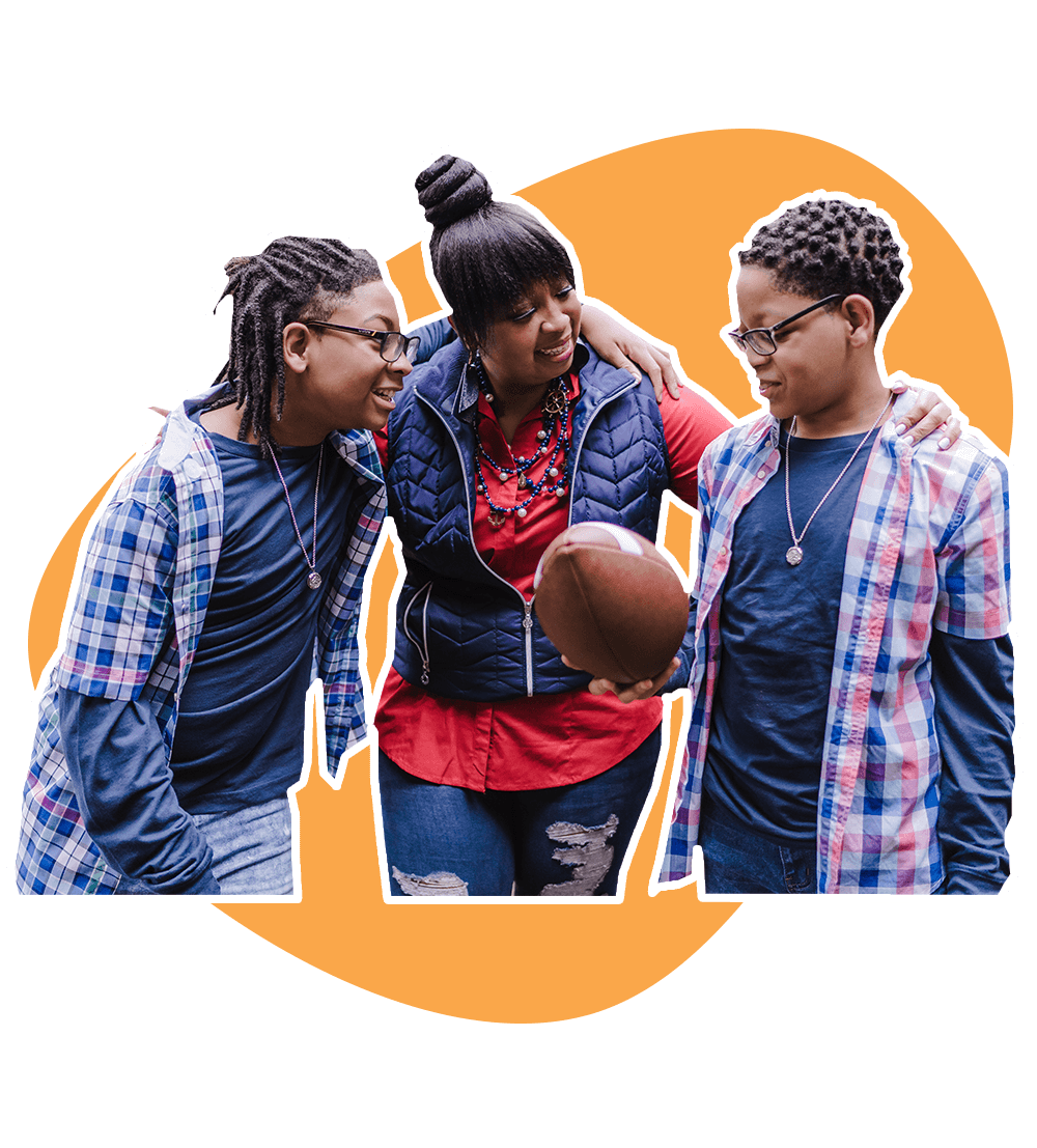 Family Play Football Outside